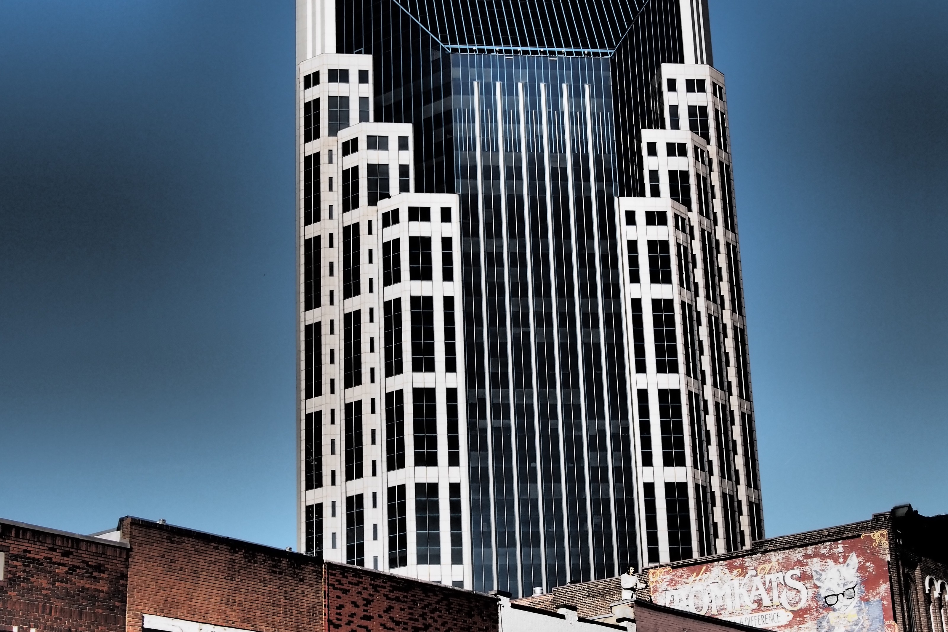 Bars and rooftops beneath the Nashville skyline.