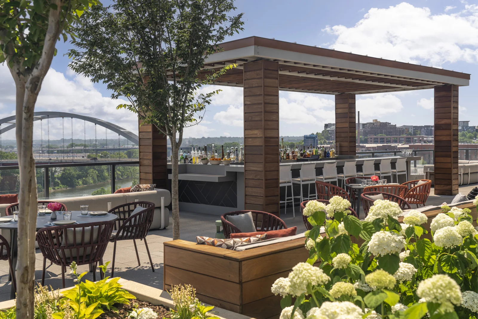 Four Seasons Hotel Nashville rooftop pool and terrace overlooking the Cumberland River.