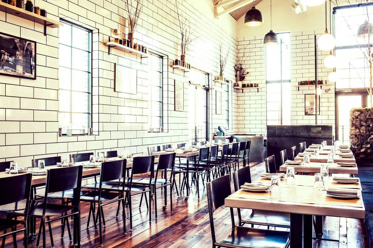 Communal dining tables inside Butchertown Hall in Germantown.